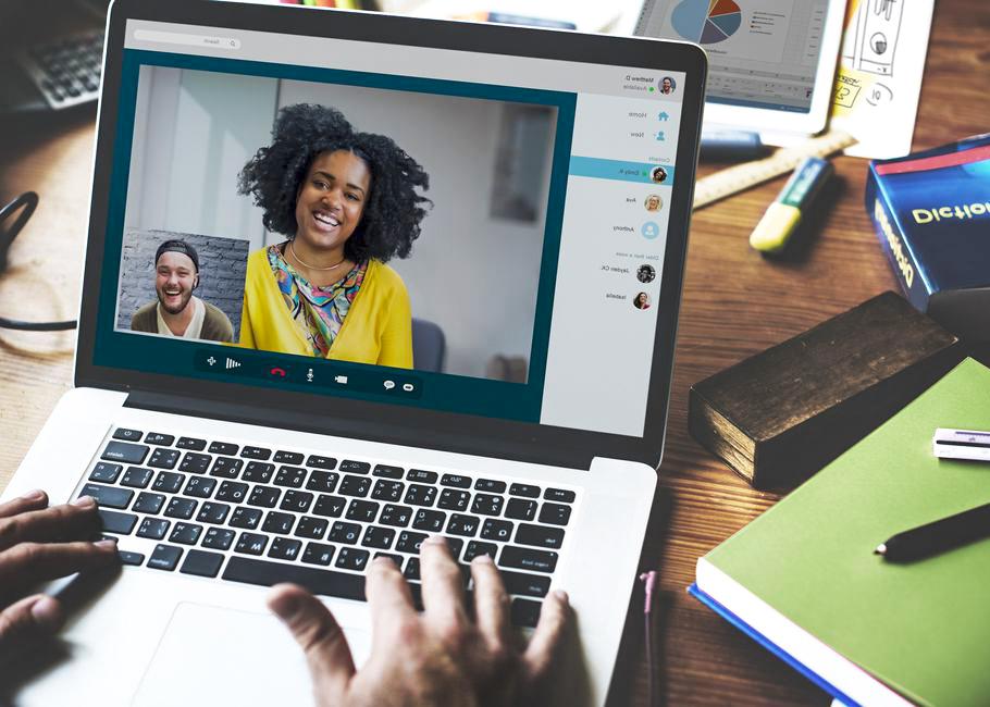 laptop screen with video conference taking place